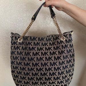 Michael Kors logo shoulder and strap bag